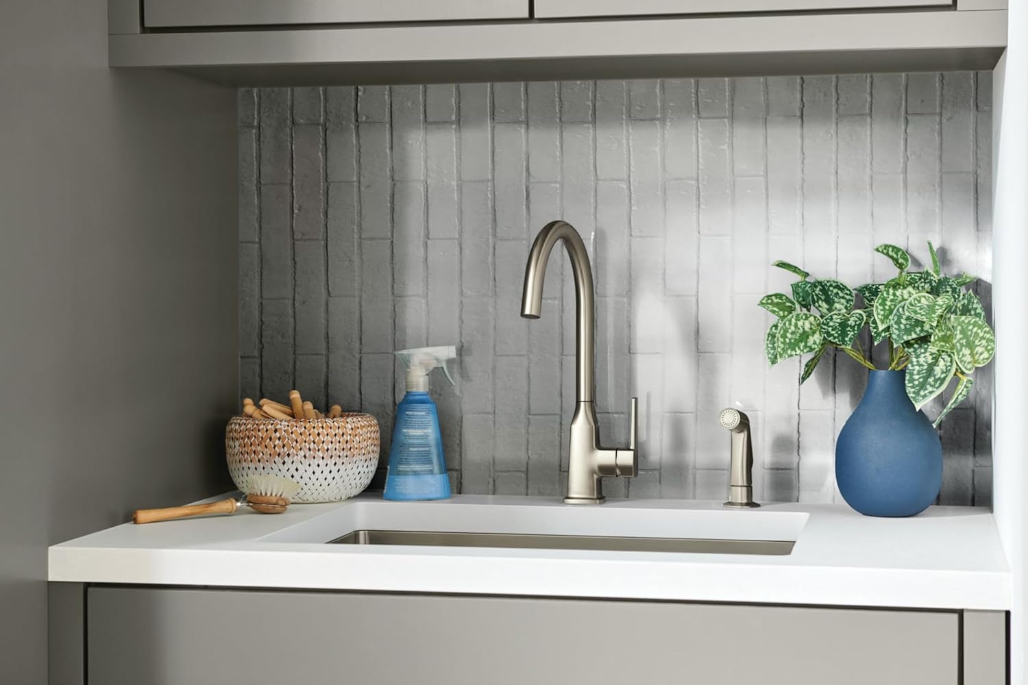 Peerless Ezra Single-Handle Kitchen Sink Faucet The Peerless Ezra Single-Handle Kitchen Sink Faucet is a stylish and functional addition to any kitchen. With its versatile features and modern design, it’s perfect for those seeking both aesthetics and convenience in their kitchen fixtures. Key Features Material: Made from durable zinc with a brushed stainless steel finish, ensuring longevity and a sleek appearance. Design: Single-handle lever control allows for easy adjustment between hot and cold water, providing a seamless user experience. Installation: Supports single-hole, 2-hole, 3-hole, or 4-hole configurations, making installation straightforward. An included deck plate ensures a seamless fit. Swivel Spout: The high-arc spout swivels a full 360 degrees, offering excellent flexibility for various kitchen tasks. Included Components: Comes with a side sprayer and deck plate for added functionality and convenience. Price Starting Price: $148.23 Pros and Cons Pros Cons Versatile installation options Higher price point compared to basic models 360-degree swivel for convenience Limited color options for some styles Durable construction with a stylish finish Side sprayer may require regular cleaning The Peerless Ezra Single-Handle Kitchen Sink Faucet is a great choice for anyone looking to upgrade their kitchen. Its combination of modern design, durability, and functional features makes it a reliable option for daily use, helping you manage kitchen tasks with ease.